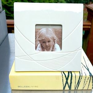 New Boxed never used Belleek Living 3x3 bone photo frame. Absolutely gorgeous.